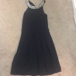 Black pleated skater halter dress